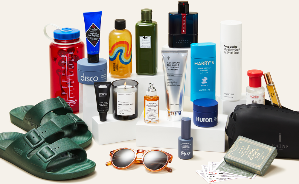 Variety of grooming, skincare, fragrance and apparel items on stands.
